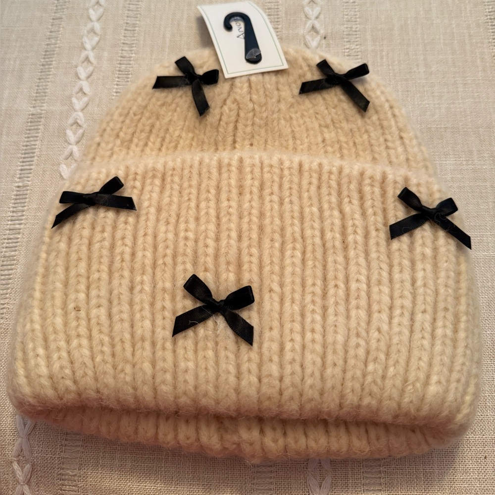 Cozy Cream Knit Beanie with Black Bows